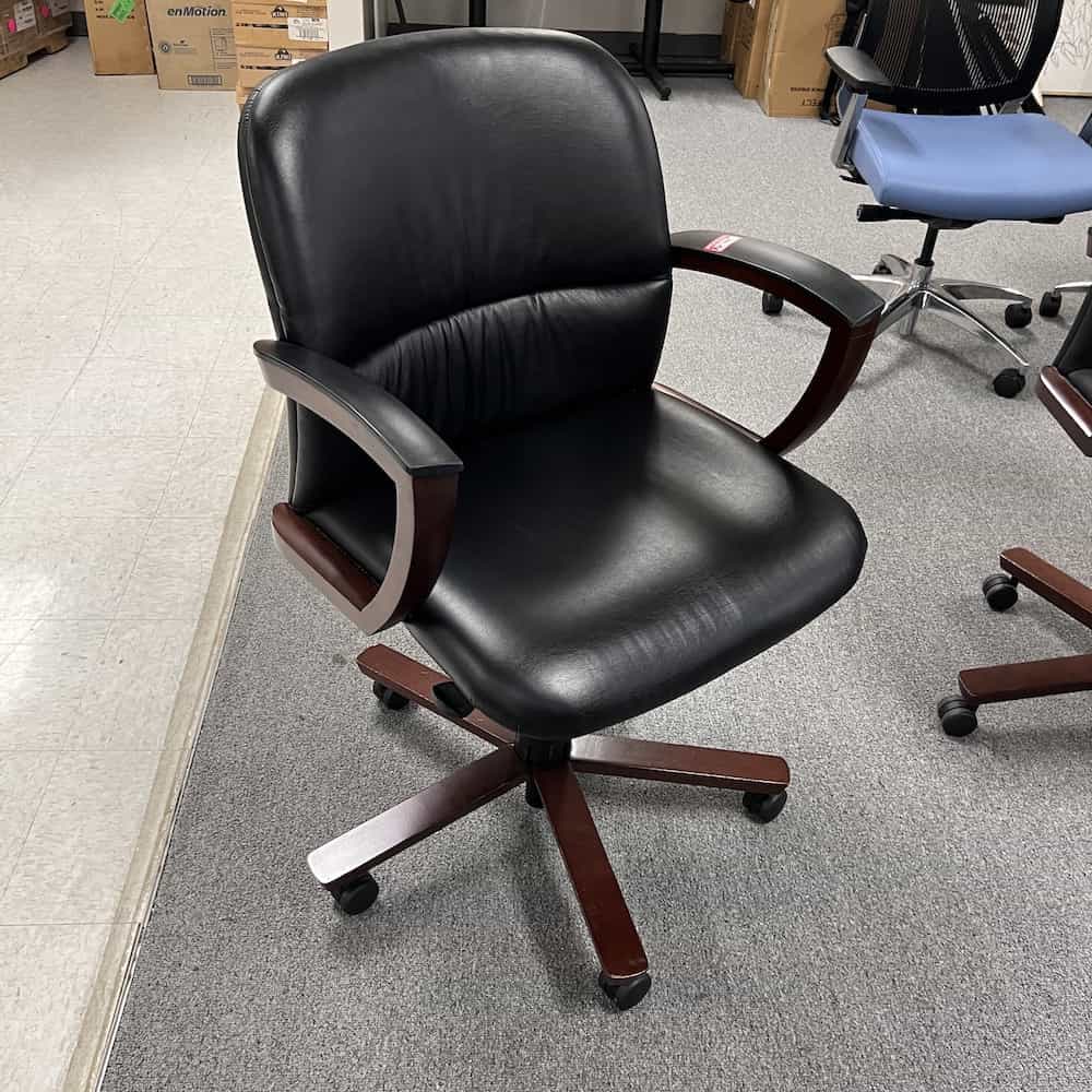 black and mahogany conference chair