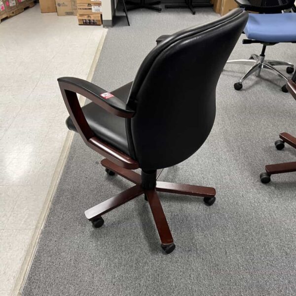 black and mahogany conference chair