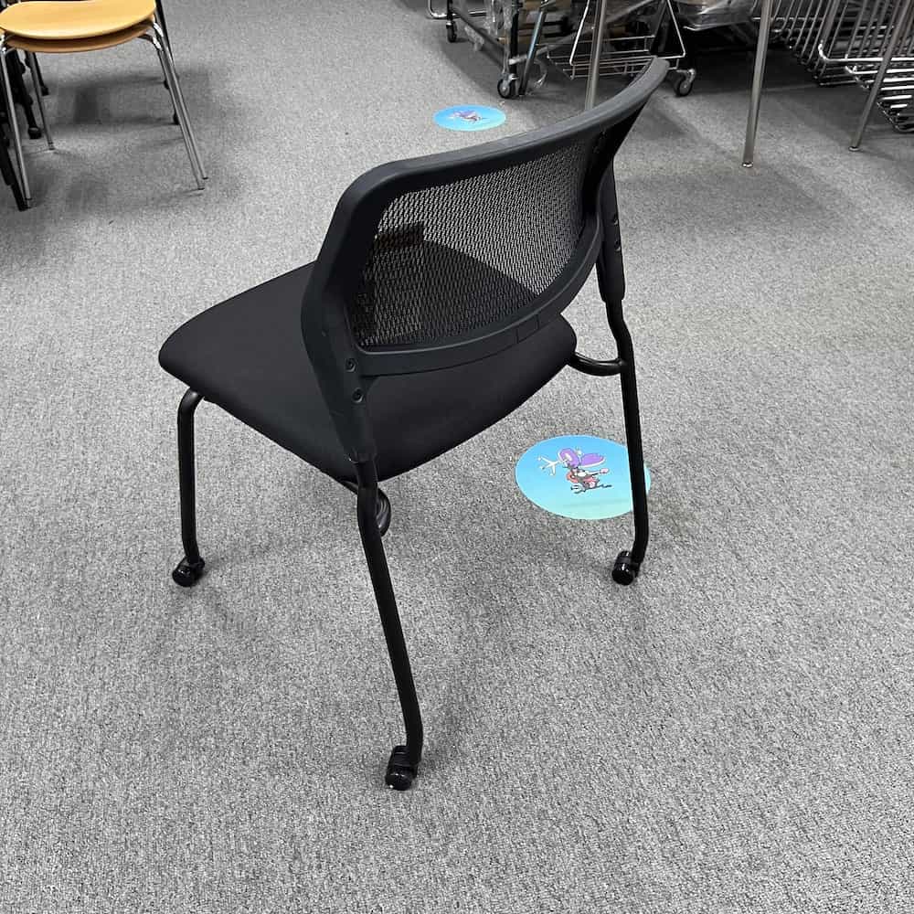 black mesh back and rolling stacking chair