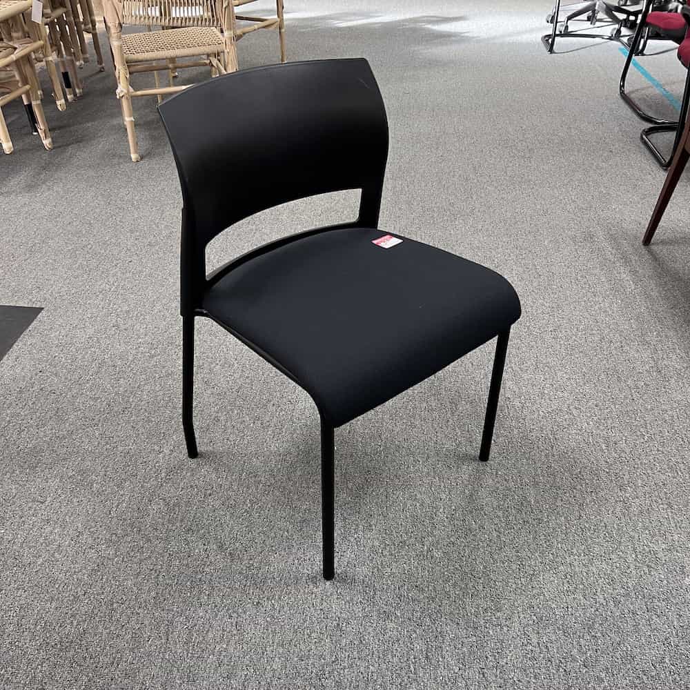 black steelcase move stacking chair with upholstered seat