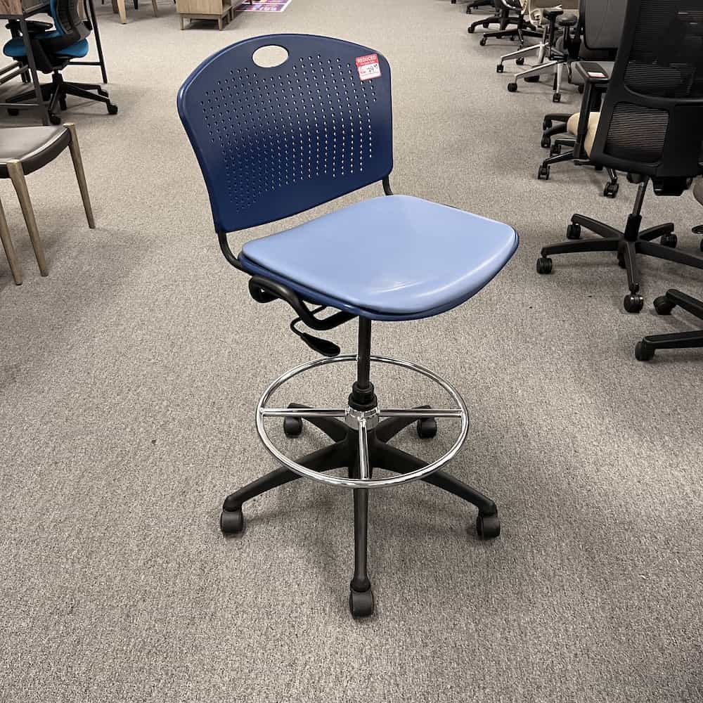 blue office stool with no arms, vinyl seat