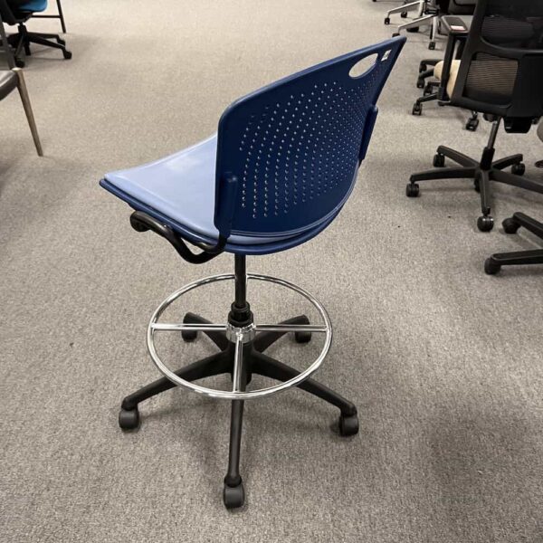 blue office stool with no arms, vinyl seat, facing back
