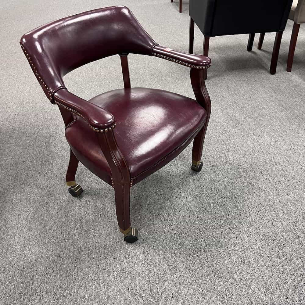 mahogany and burgundy rolling poker chair