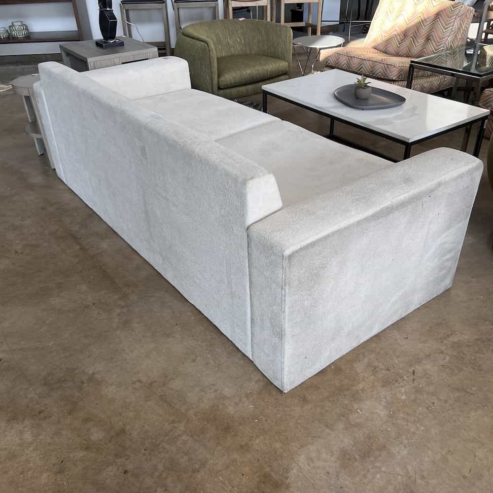 white sofa, no back pillows, no feet