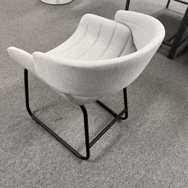 grey modern chair with black legs