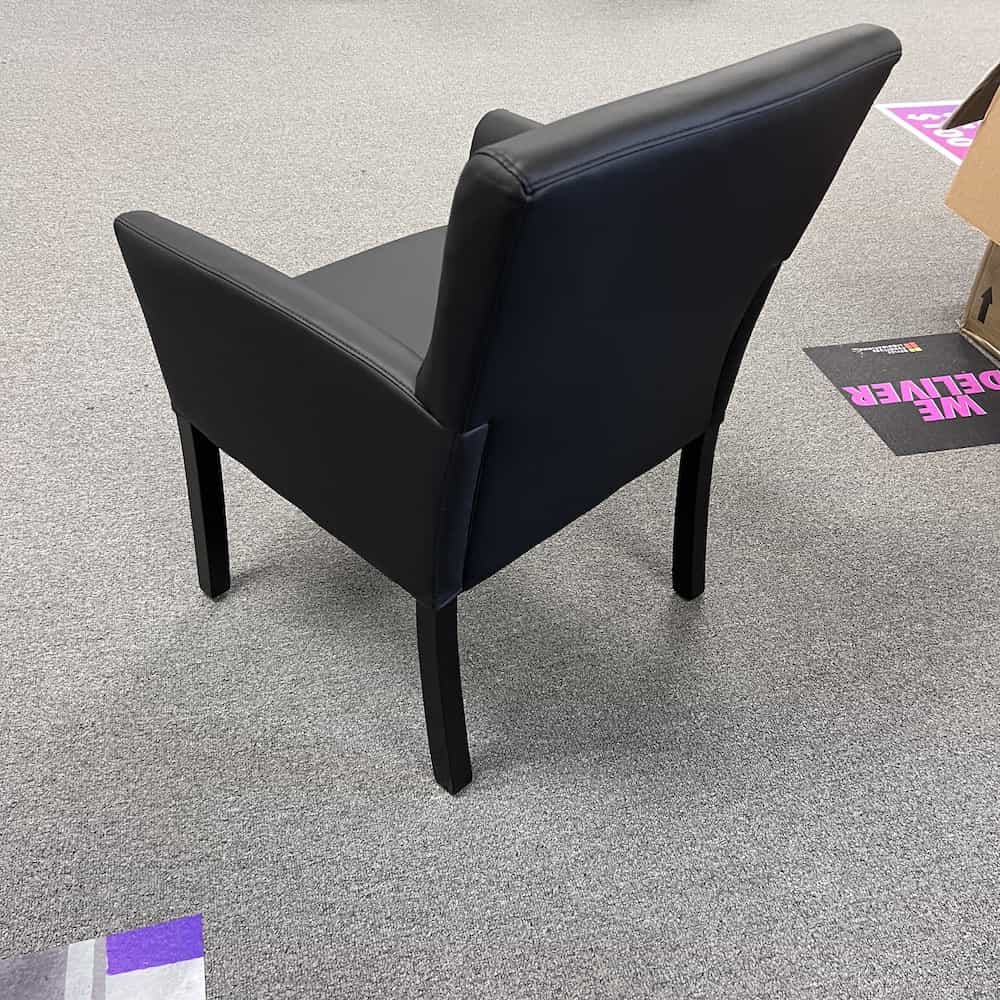 black vinyl guest arm chair