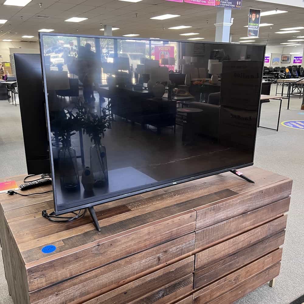 TCL smart tv 55" on a stand
