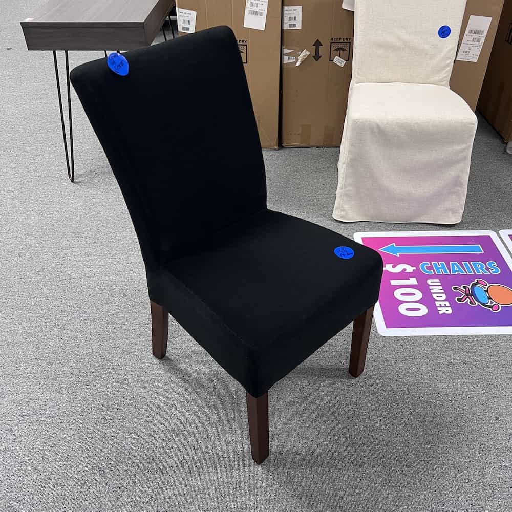 black chair under the slip cover