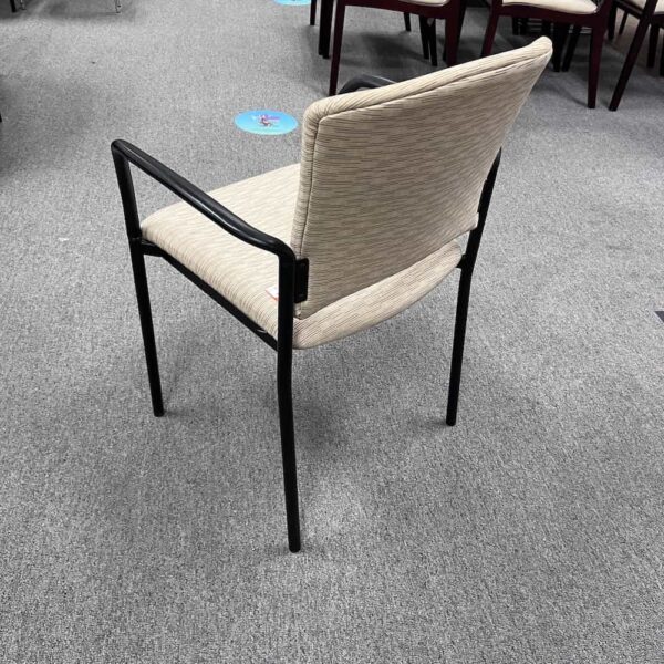cream white and black stacking chair for lobby, black arms and legs