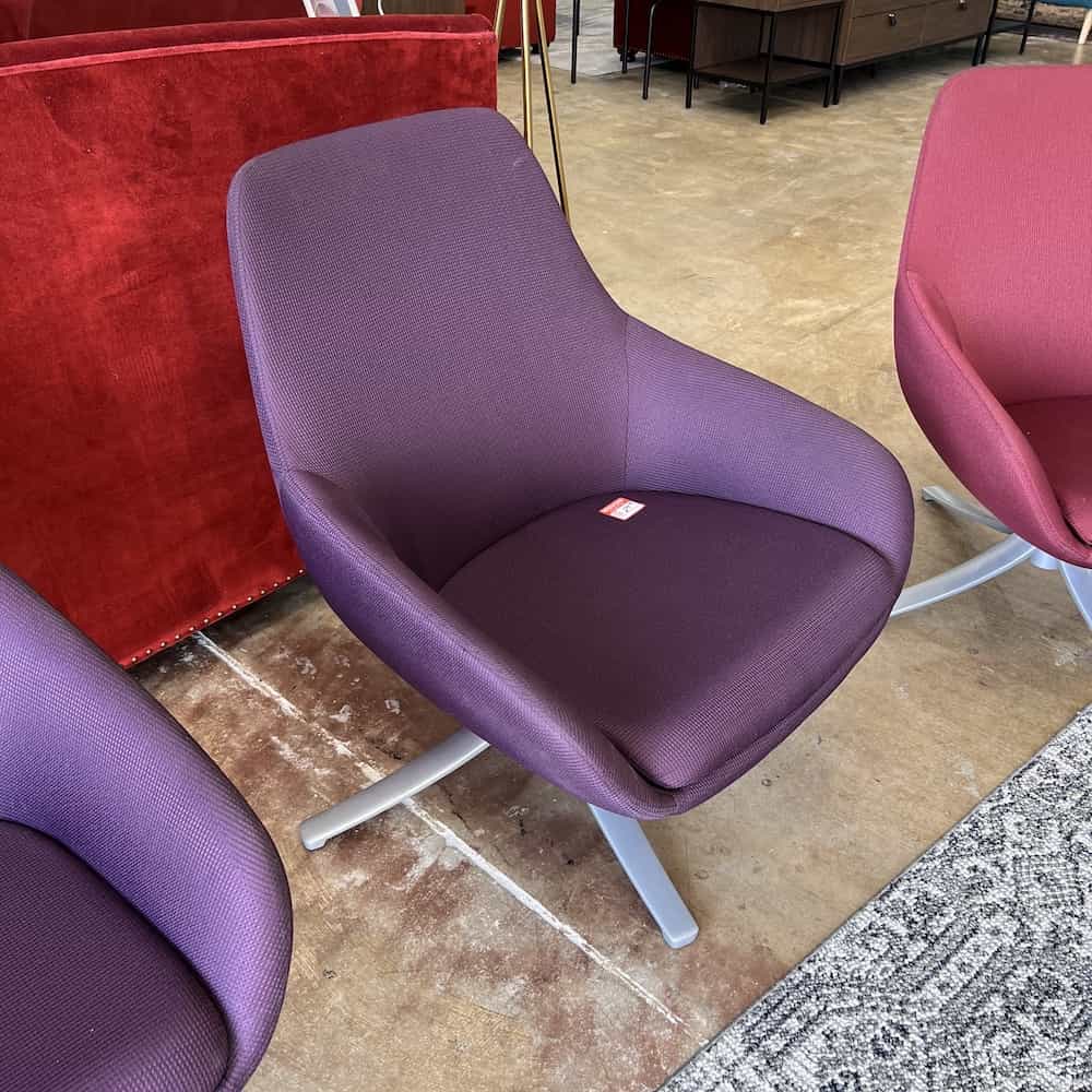 purple modern swivel chair with silver base