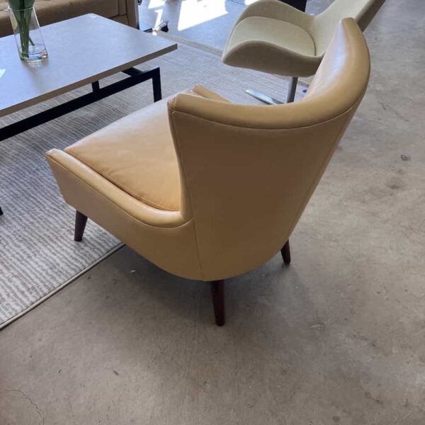 yellow leather wing back chair, back view