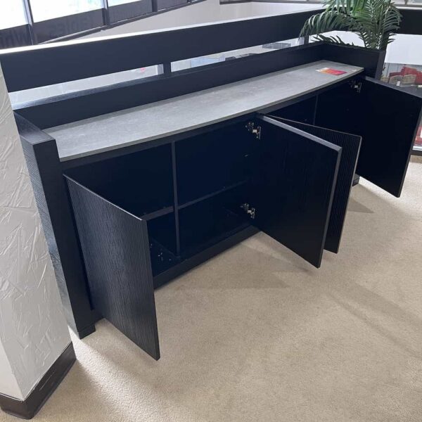 black and grey credenza with 4 doors, curved top front, open doors