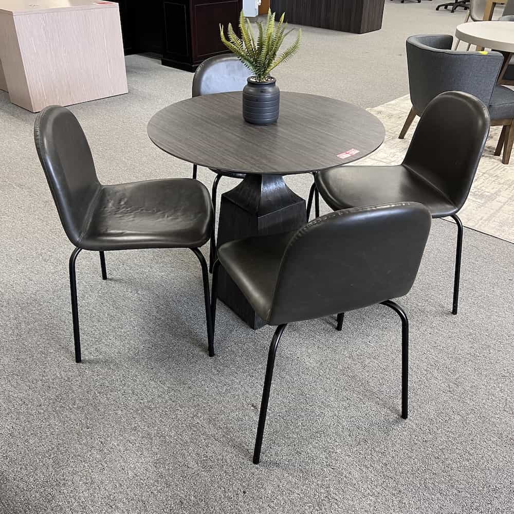dark grey table and vinyl chair set