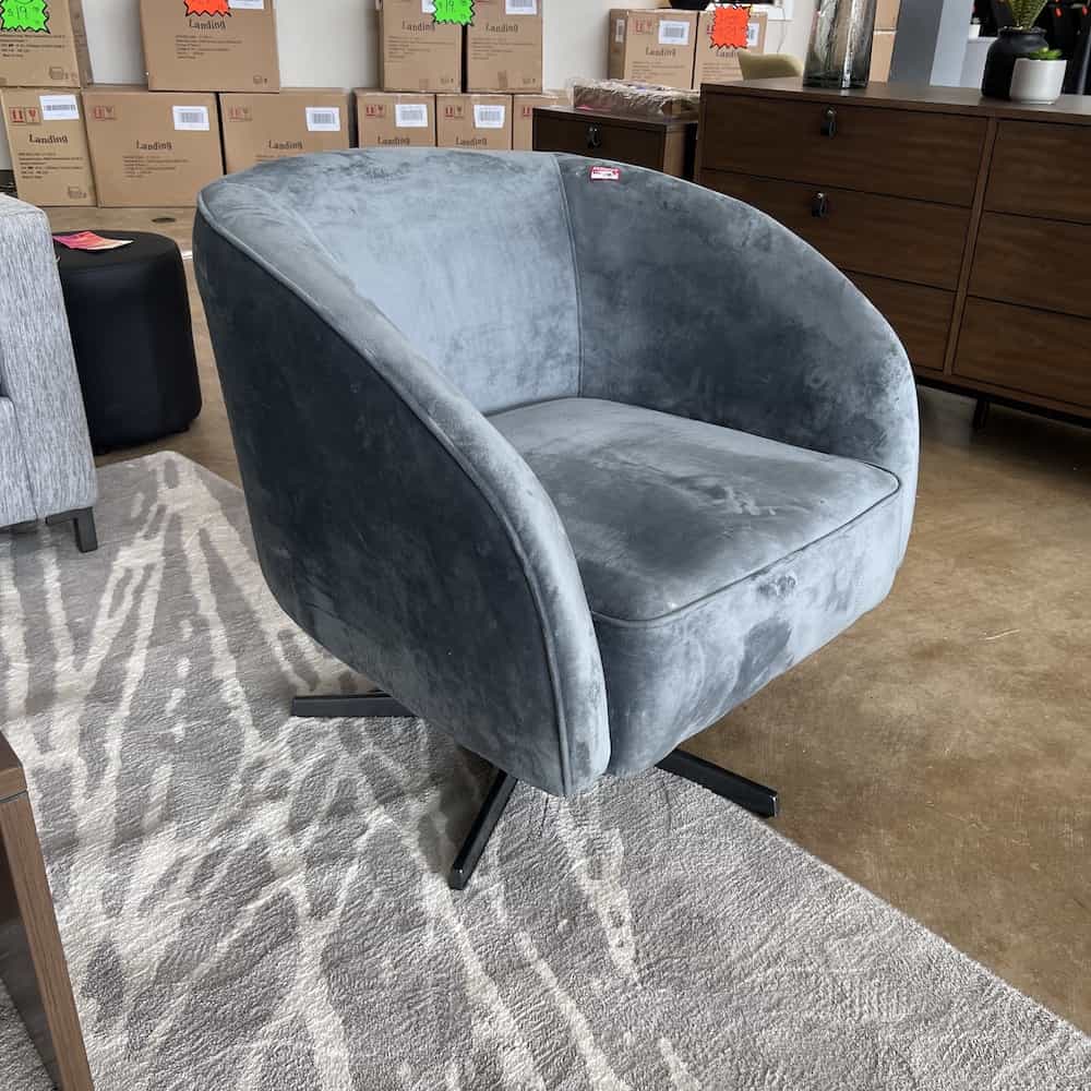 blue grey velvet swivel arm chair, black base
