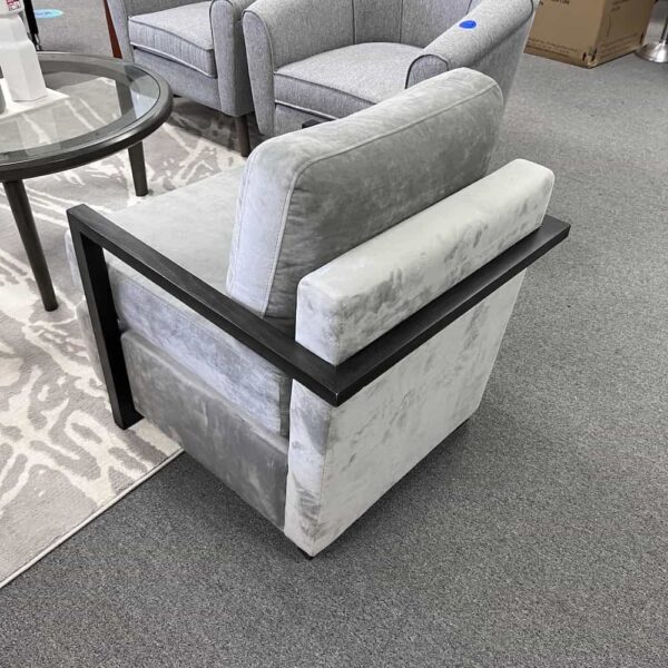 grey velour lounge chair, back