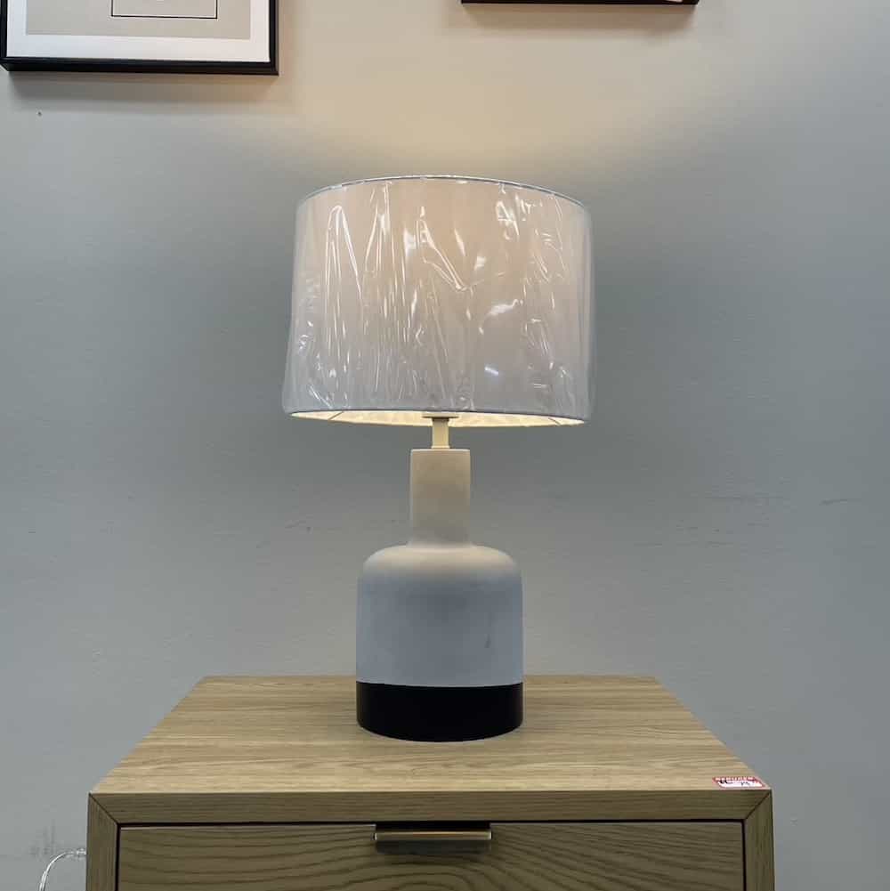 light grey lamp shade and two tone grey and black base, modern and clean lines
