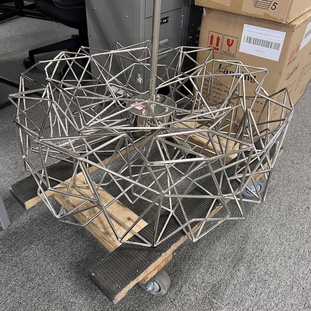 chrome iworks custom modern chandelier, wires connected in a circle nest like object