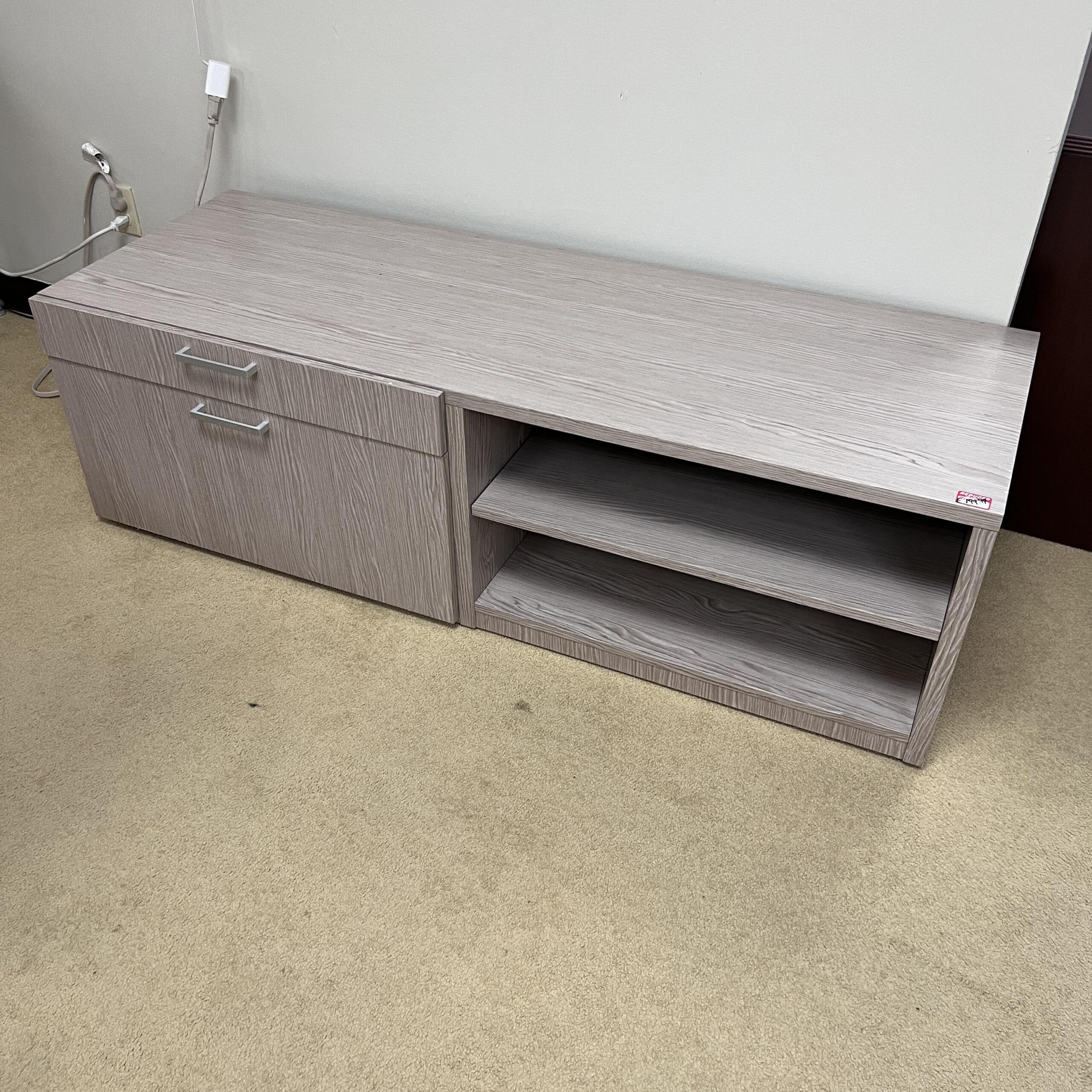 weathered grey taupe woodgrain laminate with silver pulls. credenza and one lateral file