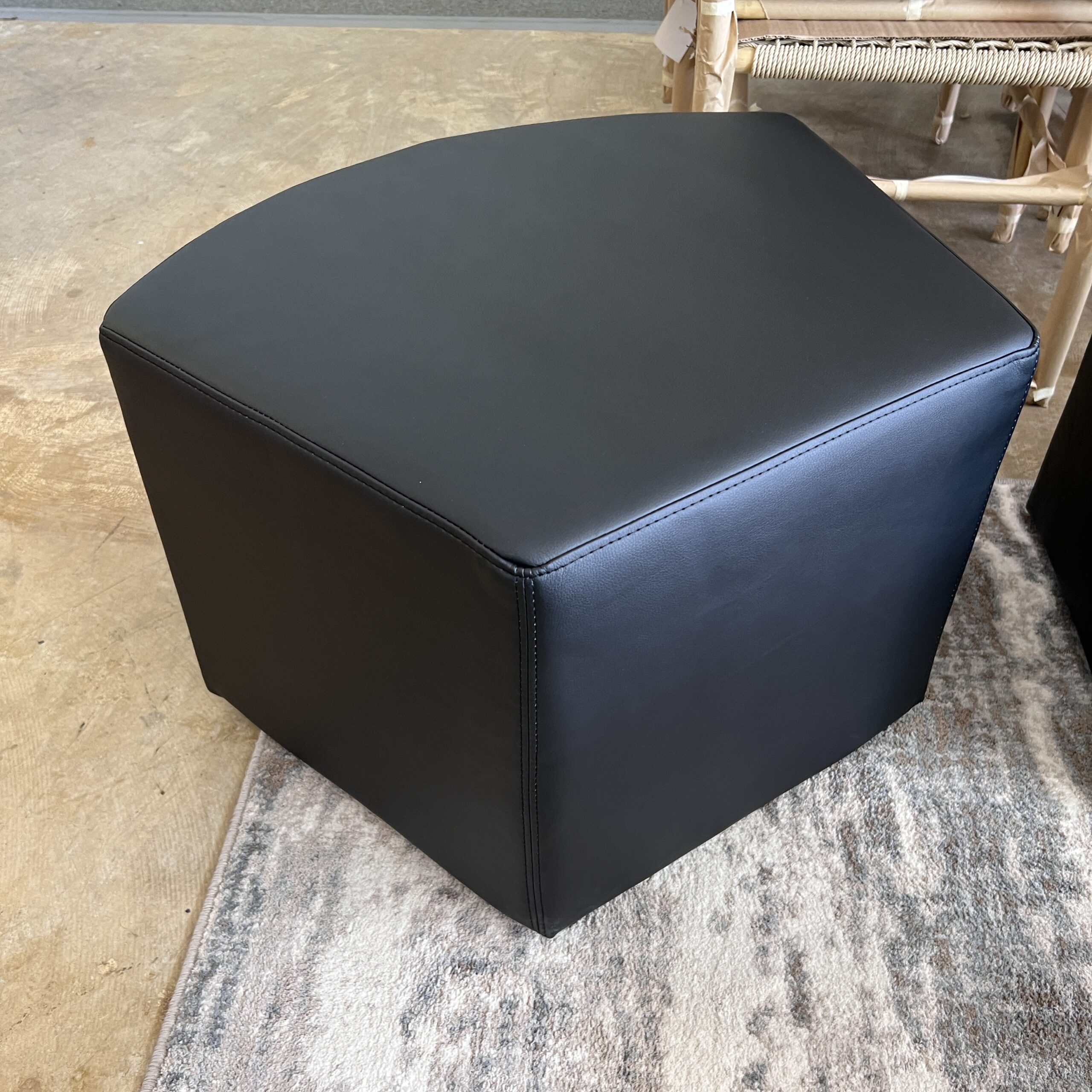 black vinyl pentagon with one rounded corner