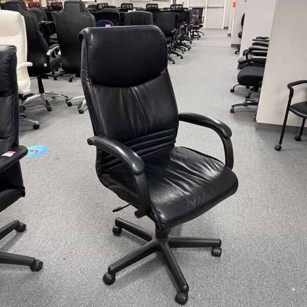 black leather high back conference chair fixed arms, front