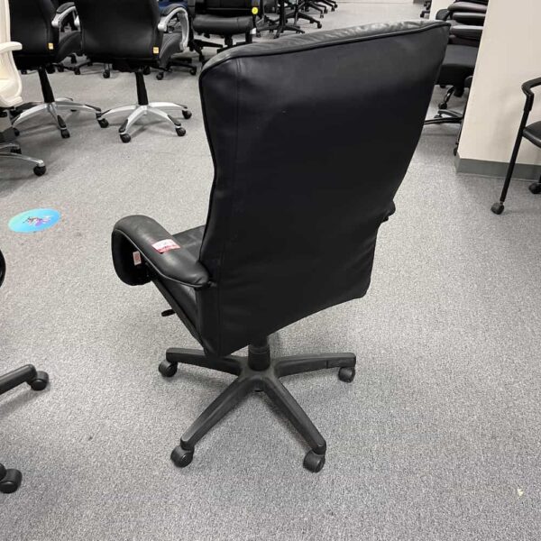 black leather high back conference chair fixed arms, back