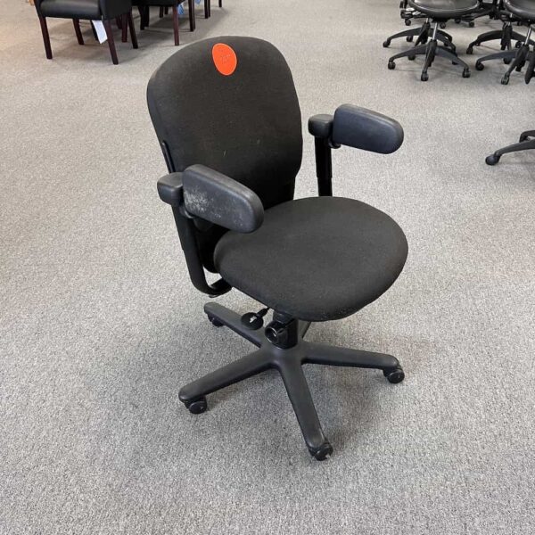 black steelcase drive, arms twisted