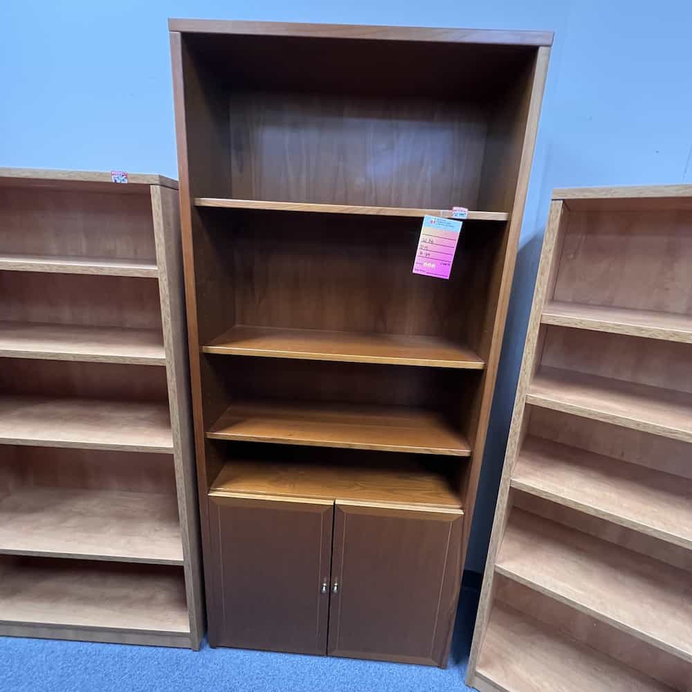 cherry bookcase with storage cabinet on the bottom, 2 doors