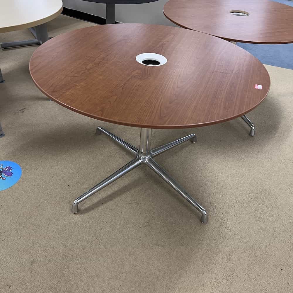 cherry round break room table with silver eames looking base, coalesse, veneer wood