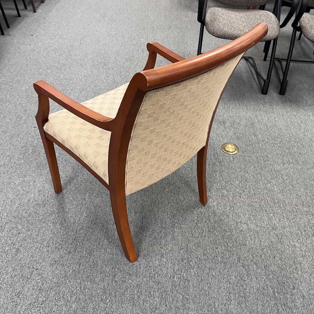 beige and cherry guest chair, with upholstered back, back view