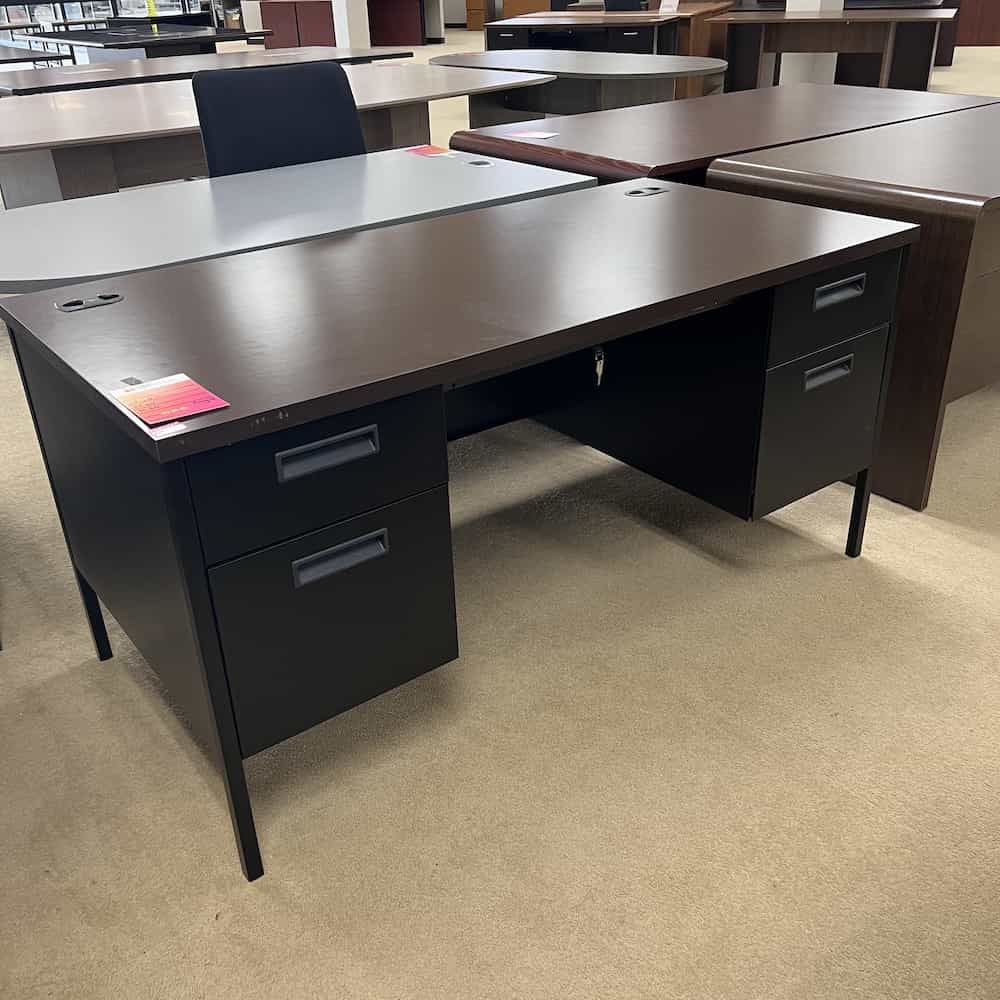 black metal desk with espresso laminate top, hanging files on either side