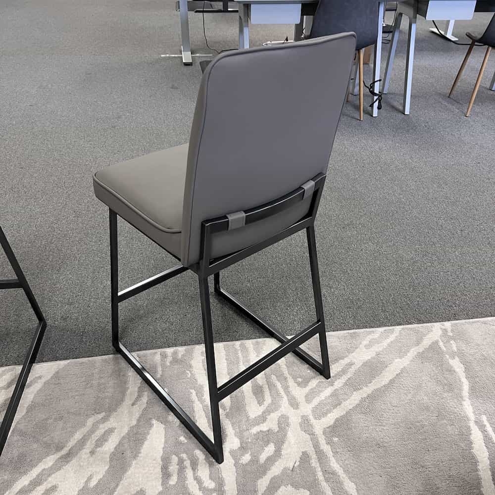 grey vinyl and metal counter height stool