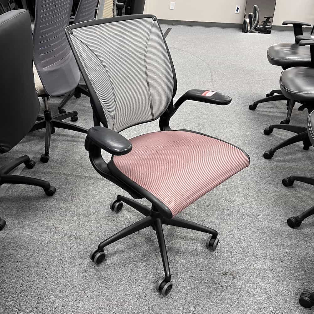 humanscale diffrient world all mesh chair with red seat and grey back, black base, front view