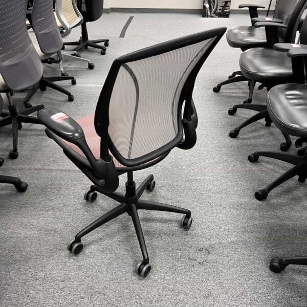 humanscale diffrient world all mesh chair with red seat and grey back, black base, back view