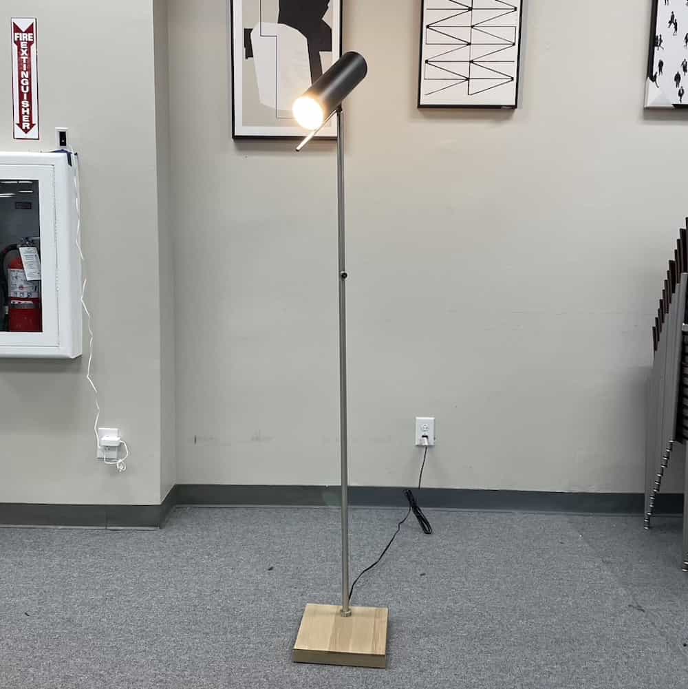 lamp, floor with square wood base, silver stick, black cylindrical head that swivels and moves