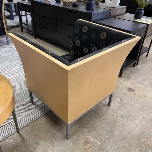 maple lounge chair with veneer outside and upholstered inside, back