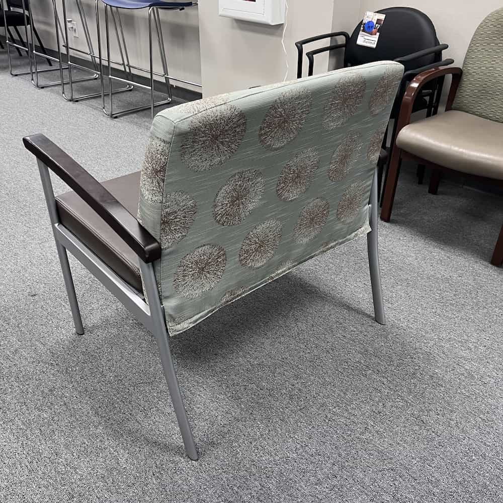 tan vinyl seat, light blue starburst upholstered back, bariatric wide chair with silver base, back