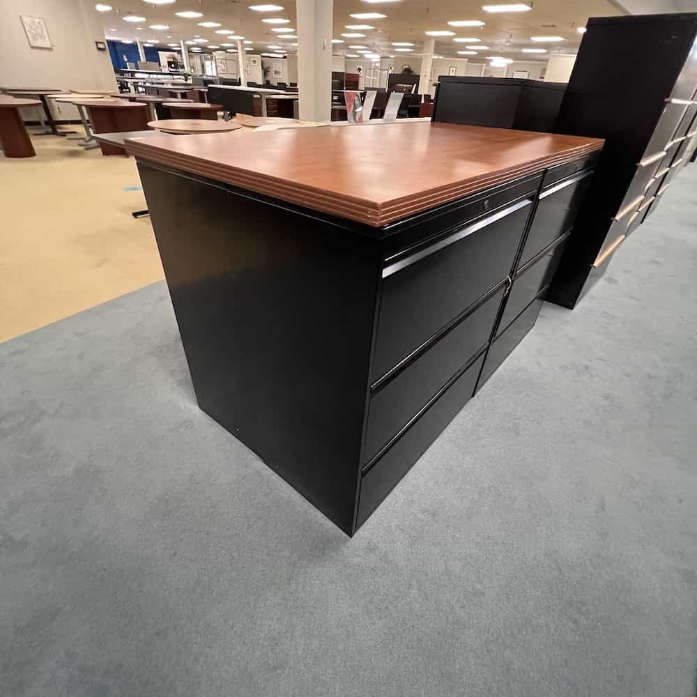 black lateral file 3 drawer with cherry laminate top, 4 cabinets put together 2x2