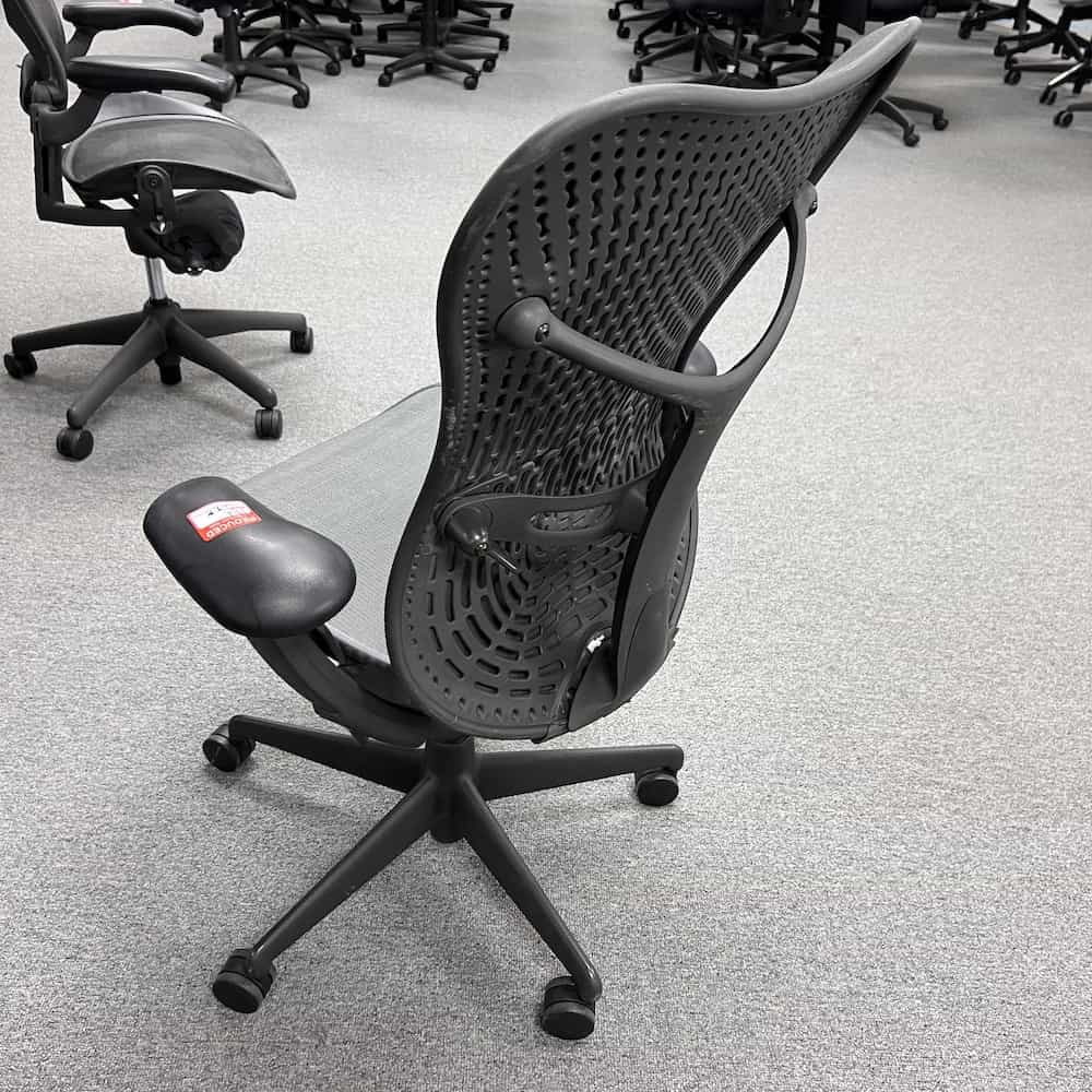 mirra chair with rounded back corders and very rounded arm rests, mesh mesh, back view