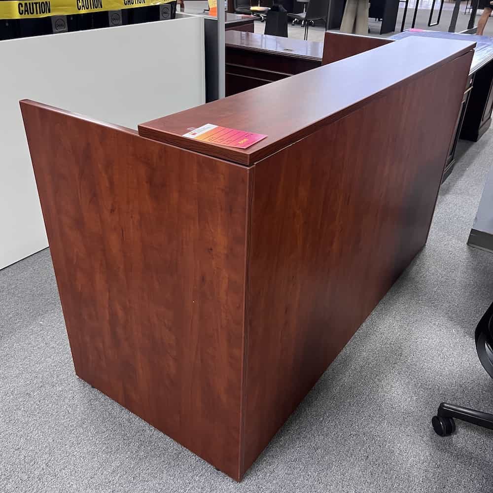 cherry laminate shell reception desk with flat front transaction top, front view