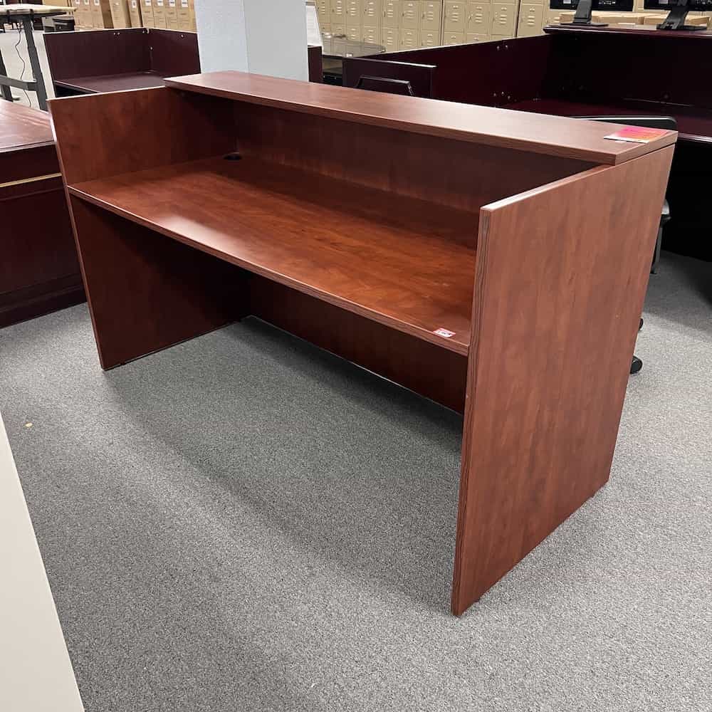 cherry laminate shell reception desk with flat front transaction top