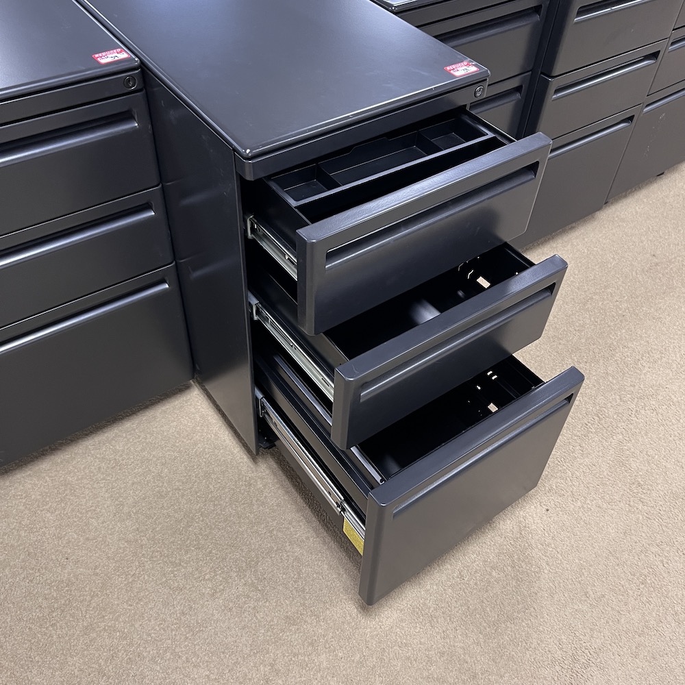 dark grey metal box box file drawers open in tiers