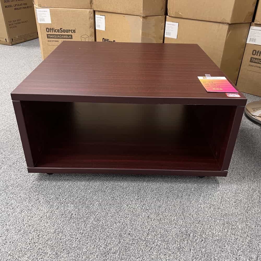 mahogany laminate box coffee side table. it has two sides, short, floating look