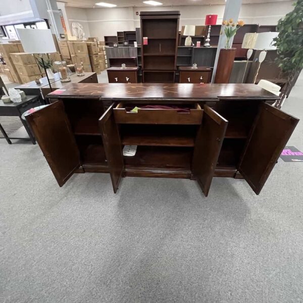 walnut buffet with scrolling light color inlay, four doors open
