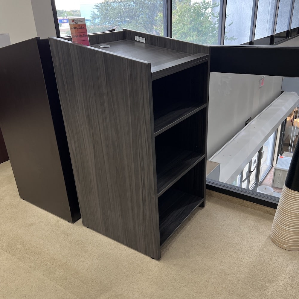 new podium lecturn in laminate, with angled top and two shelves, dark grey