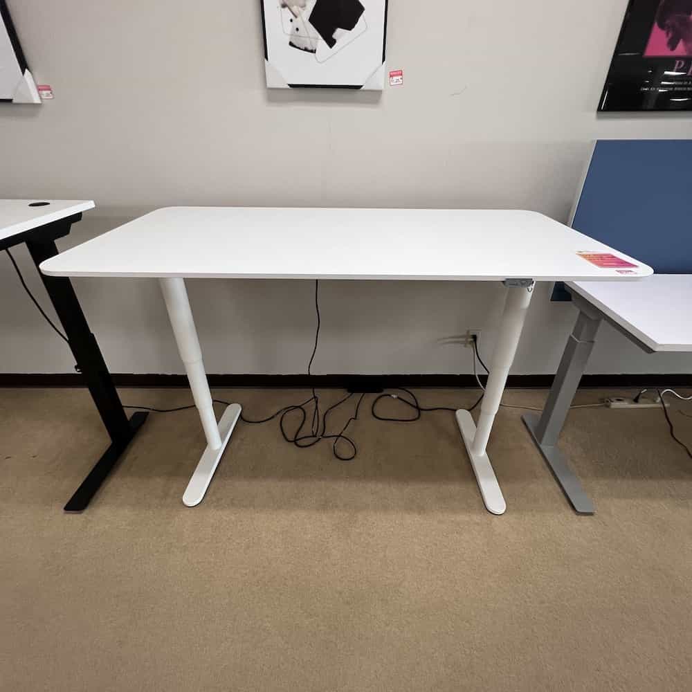 ikea bekant table with with electrical height adjust, white telescoping legs