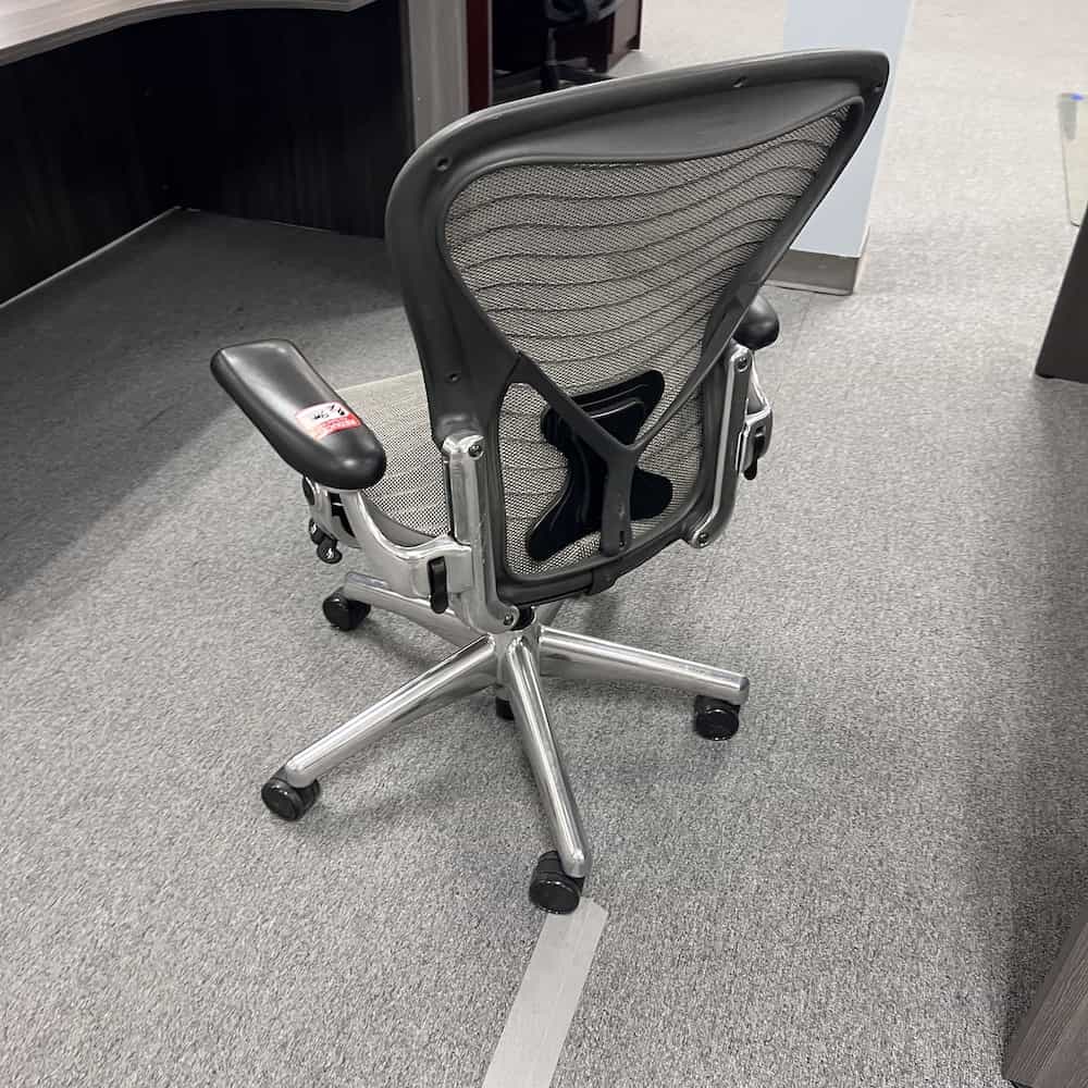 silver mesh and black frame used herman miller aeron with posturefit back, back view