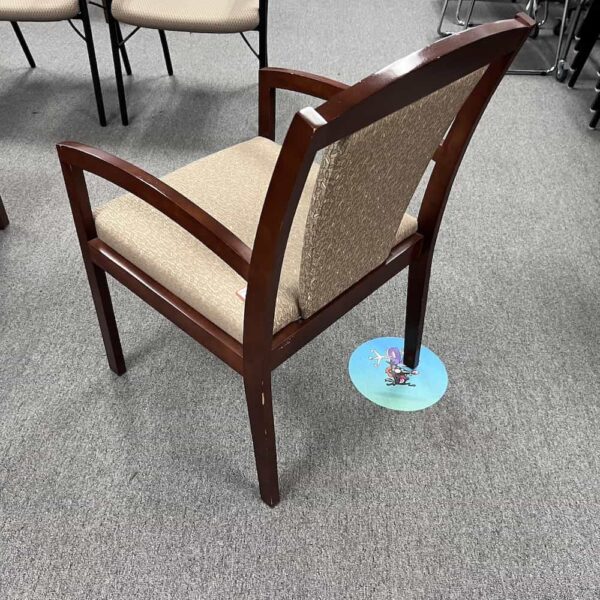 national tan and mahogoany guest chair with v back portion, back view