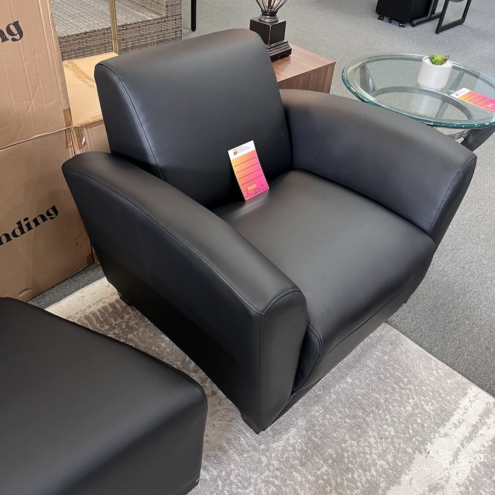 black vinyl accession club chair with rounded arms