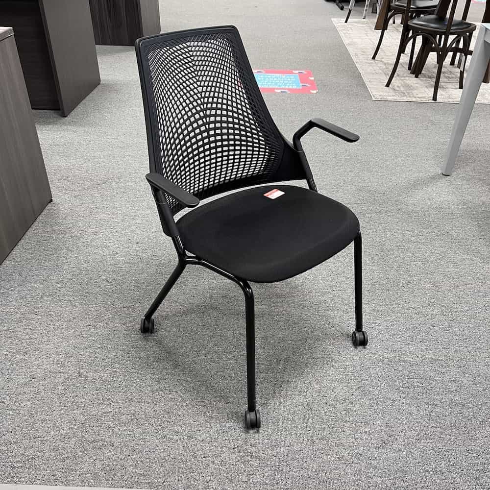 black seat and elastometer back sayl rolling chair with arms
