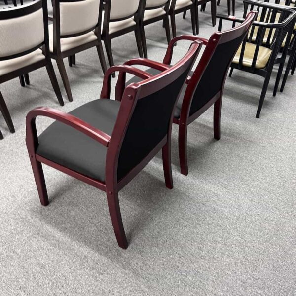 black upholstered seat with cherry veneer arms